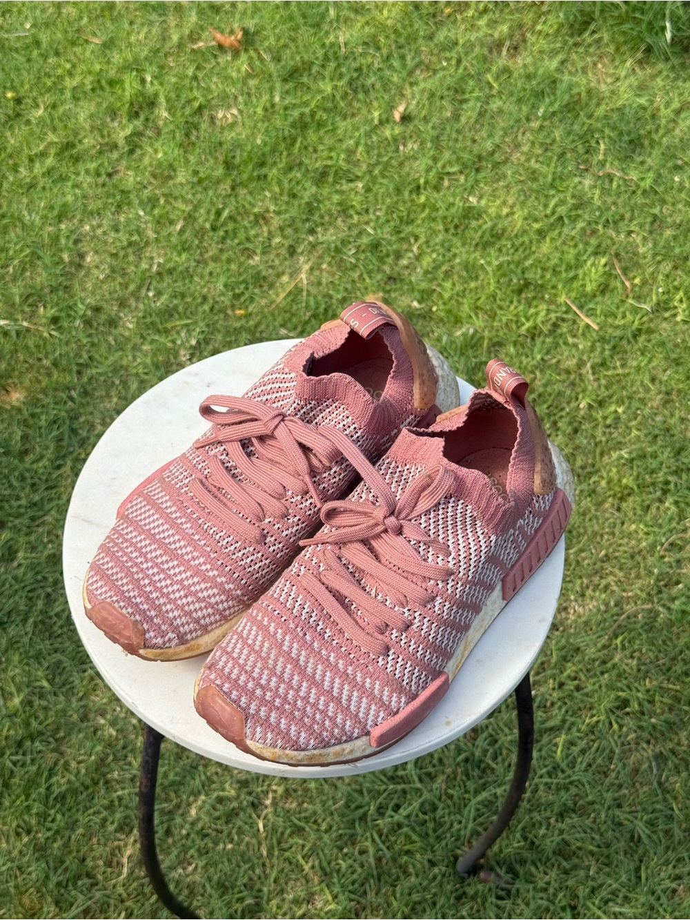 Adidas NMD_R1 STLT Primeknit sneakers in a pink and white